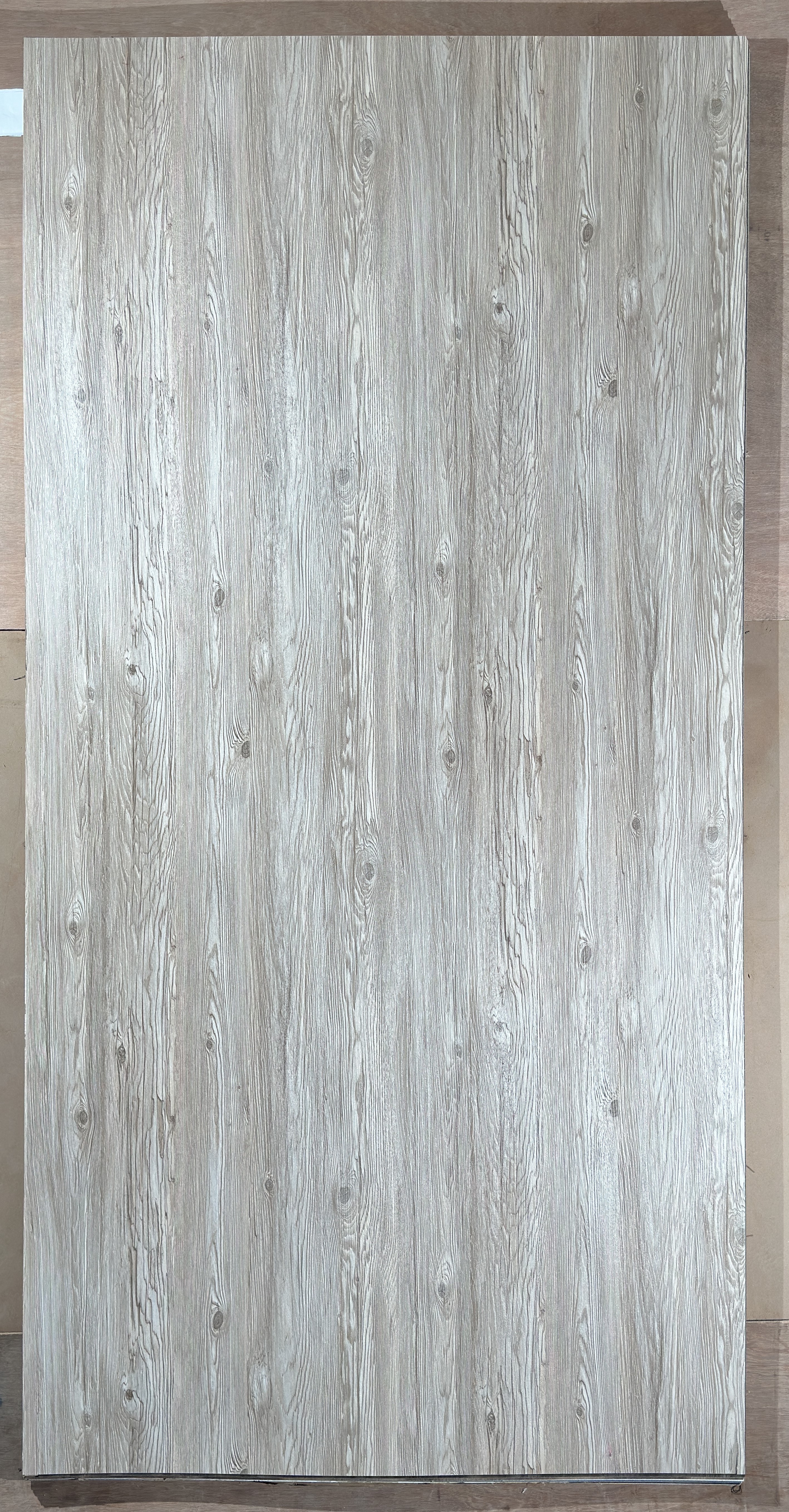 A close-up of a Brown 88076 WO with a Texture finish Decorative Laminate available at Material Depot in Bangalore